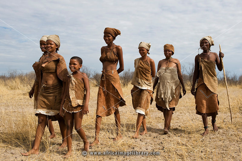 Naro bushman (San) women walking, Central Kalahari, Botswana